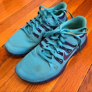 Turquoise and purple Nike Free Runs